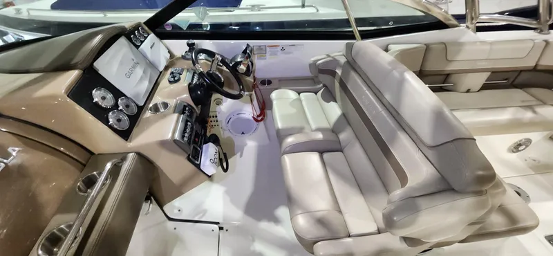 Slide: The Image of 2015 Formula 350 CBR boat interior with helm and seating area. - 14