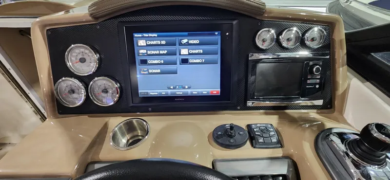 Slide: The Image of 2015 Formula 350 CBR dashboard with touchscreen display and gauges. - 31