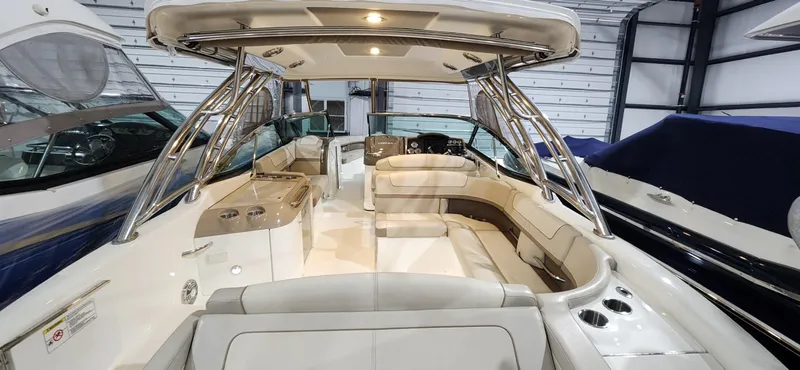 Slide: The Image of 2015 Formula 350 CBR boat interior with luxurious seating and modern amenities. - 35