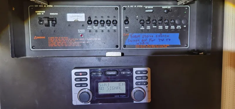 Slide: The Image of Control panel and stereo system in a 2015 Formula 350 CBR boat. - 38