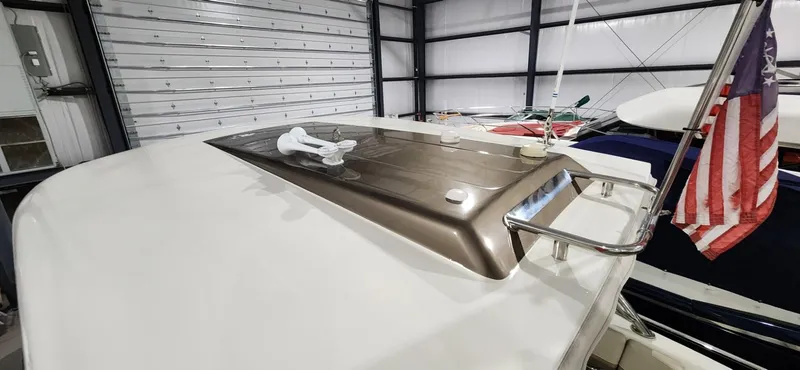 Slide: The Image of 2015 Formula 350 CBR boat in storage with American flag. - 39