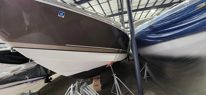 Slide: The Image of 2015 Formula 350 CBR boat in storage, side view. - 41