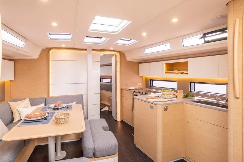 Slide: The Image of Modern interior of 2024 Dufour 41 yacht with dining area and kitchen. - 10