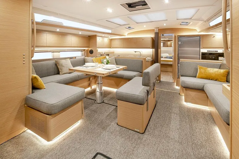 Slide: The Image of Luxurious interior of 2024 Dufour 530 yacht with modern seating and elegant lighting. - 10