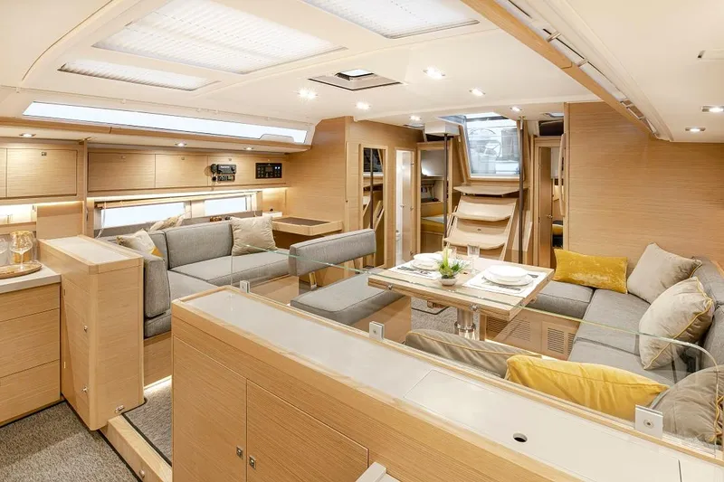 Slide: The Image of Luxurious interior of 2024 Dufour 530 yacht, featuring modern design and comfortable seating. - 9