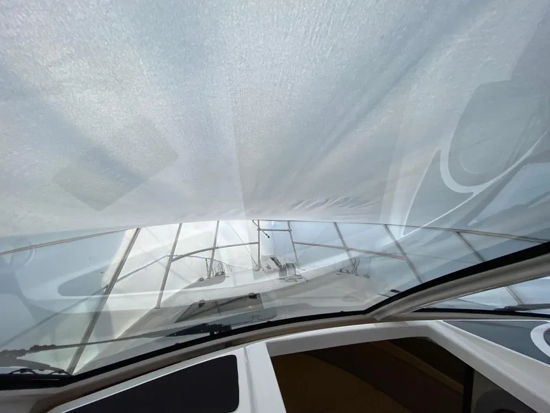 Slide: The Image of 2024 Solara S-250 C boat interior view through windshield. - 26