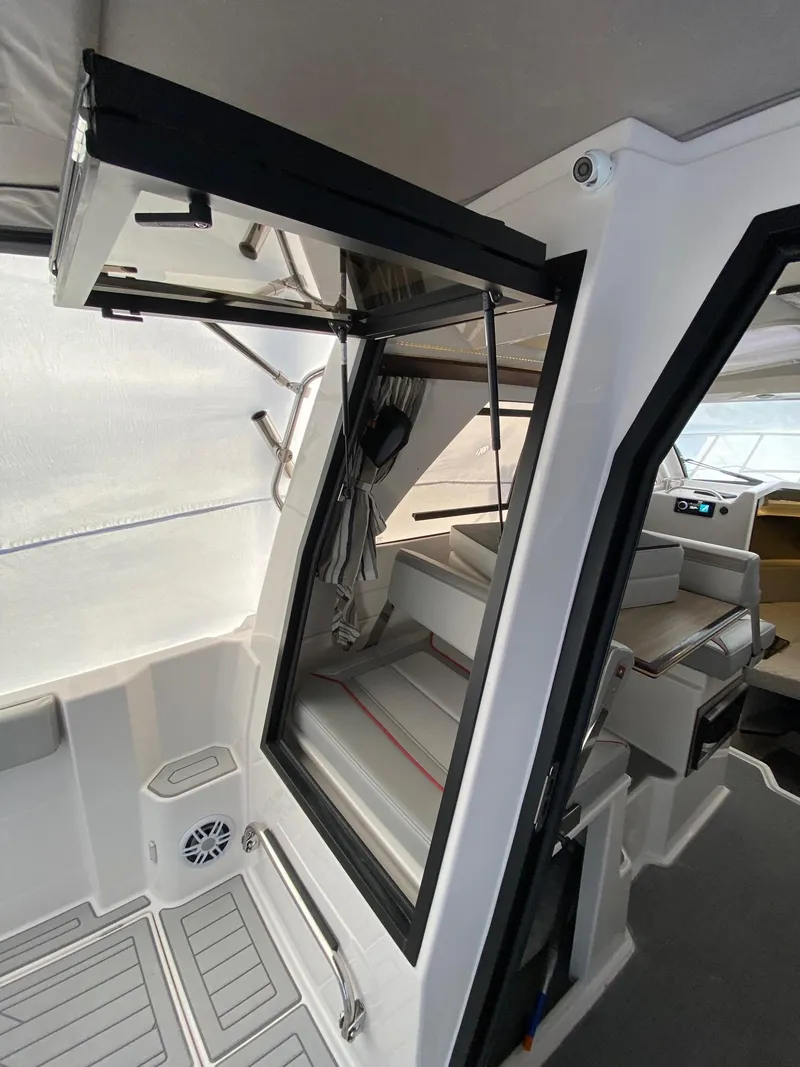 Slide: The Image of 2024 Solara S-250 C boat interior with open door and steps. - 4