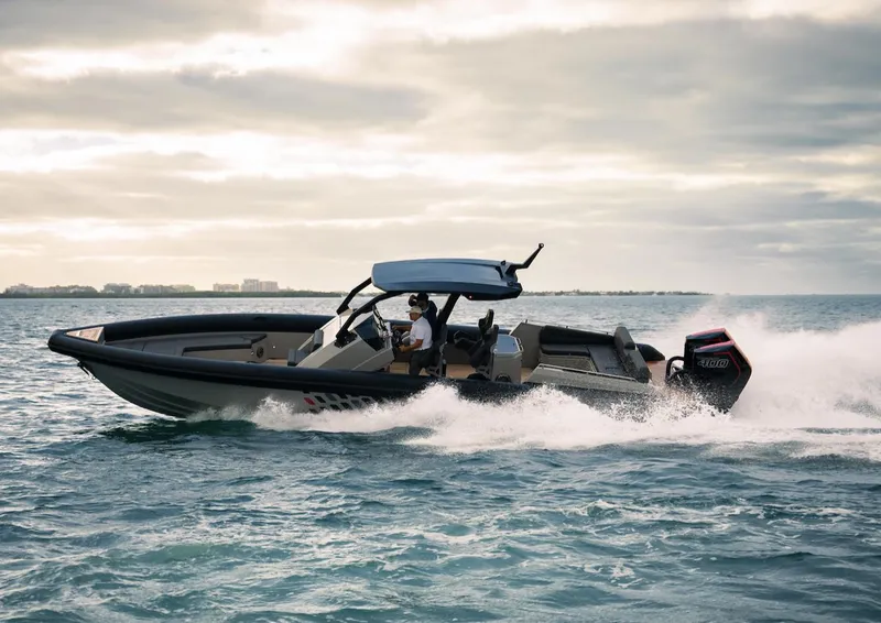 Slide: The Image of 2024 Skipper-BSK 38 boat cruising on open water. - 19