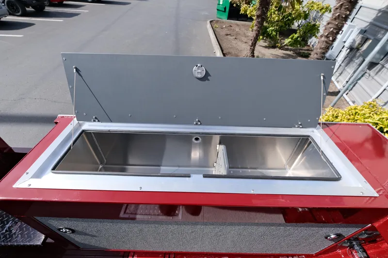 Slide: The Image of 2024 Hewescraft 220 Ocean Pro ET HT boat with open storage compartment. - 15