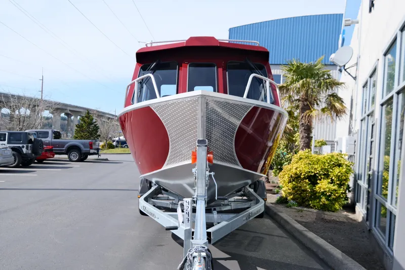 Slide: The Image of 2024 Hewescraft 220 Ocean Pro ET HT boat on trailer, front view. - 3