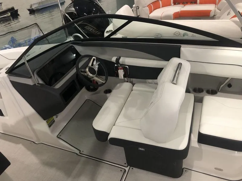 Slide: The Image of 2024 Regal LS2 boat interior with white seating and modern dashboard design. - 4