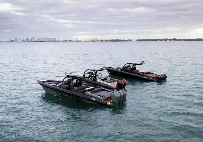 Slide: The Image of Three Skipper-BSK 38 boats on the water, 2024 model. - 16