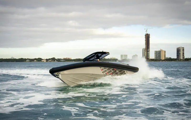 Slide: The Image of Skipper-BSK 38 boat cruising on water, 2024 model. - 20