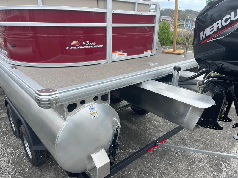 Slide: The Image of 2024 Sun Tracker Party Barge 20 DLX pontoon boat with Mercury outboard motor. - 5