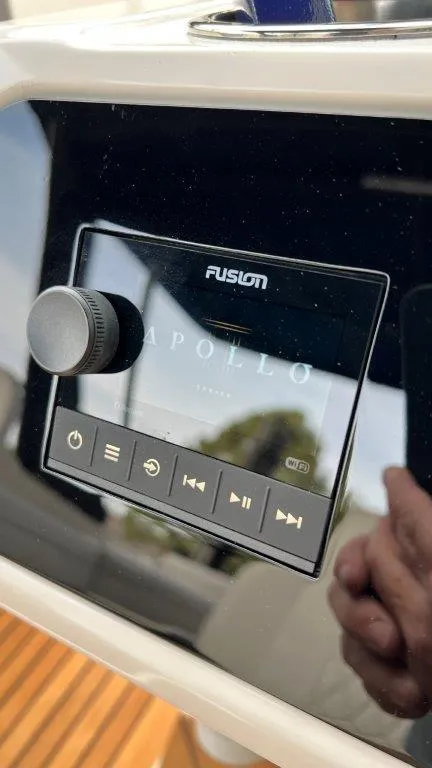 Slide: The Image of Fusion audio system on 2022 Sea Ray SLX 280 boat dashboard. - 13