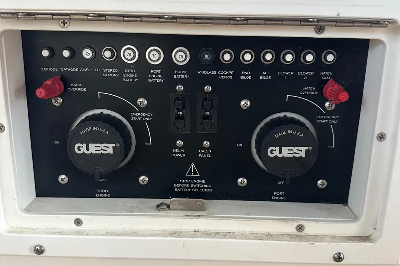 Slide: The Image of Control panel of a 2006 Rinker 360 Express Cruiser boat. - 14