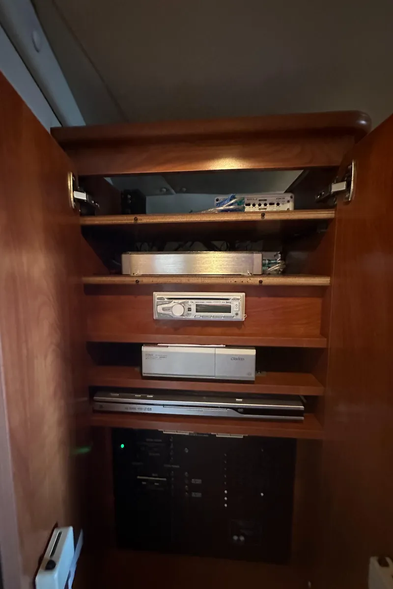 Slide: The Image of Entertainment system inside a 2006 Rinker 360 Express Cruiser yacht. - 29