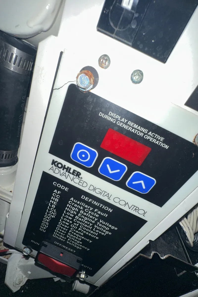 Slide: The Image of Kohler advanced digital control panel on a 2006 Rinker 360 Express Cruiser. - 33