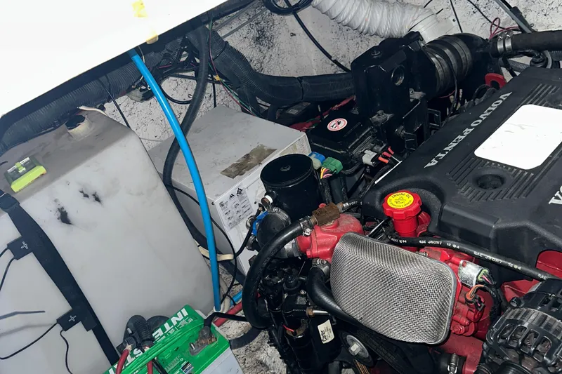 Slide: The Image of Engine compartment of a 2006 Rinker 360 Express Cruiser with Volvo Penta engine. - 36