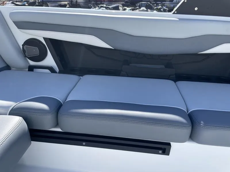 Slide: The Image of 2024 Axis T220-r boat interior seating with gray and white upholstery. - 6