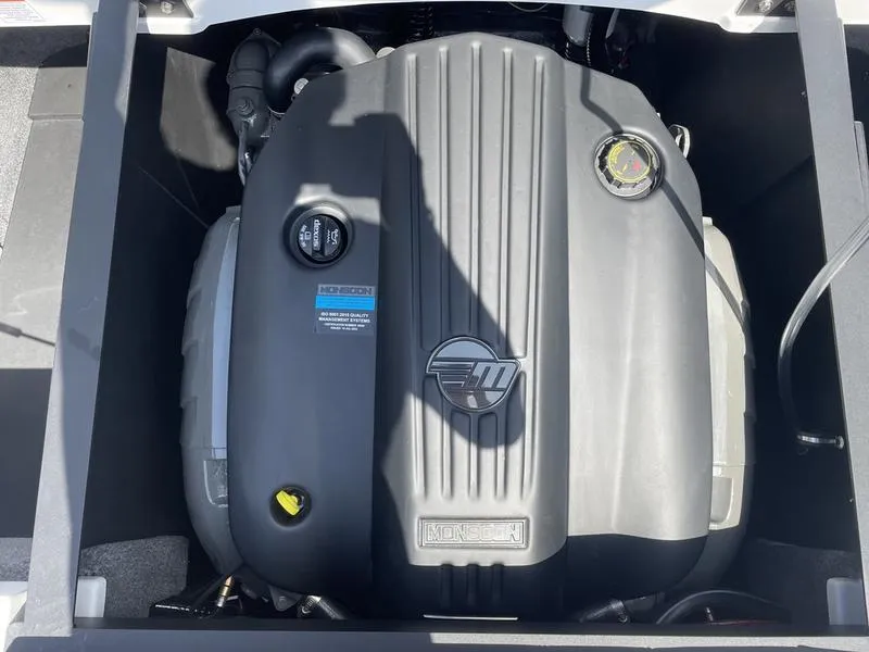 Slide: The Image of 2024 Malibu 21 LX boat engine compartment with Indmar engine. - 7