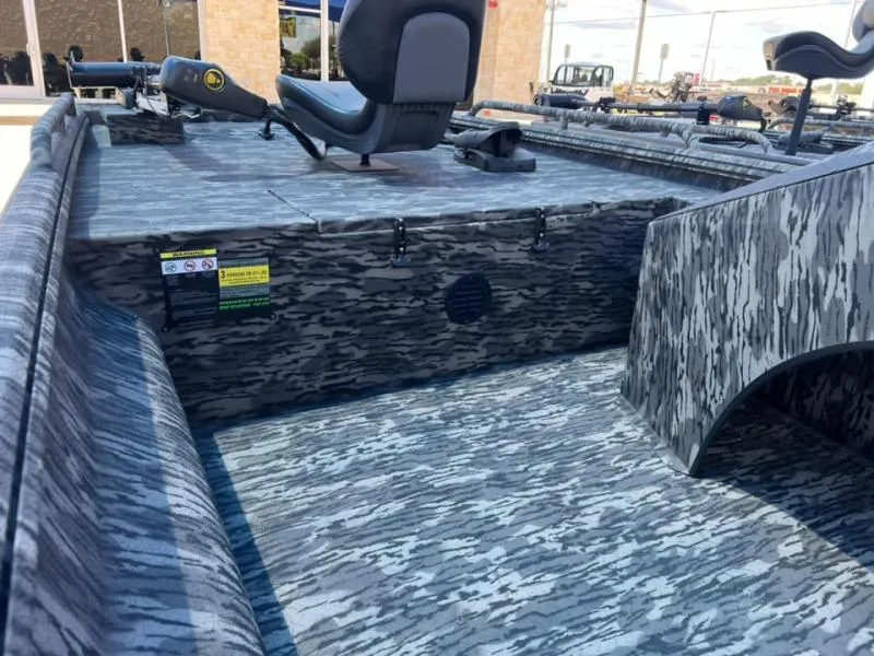 Slide: The Image of 2024 Havoc Boats 1756 FRRSC with camo interior and seating. - 6