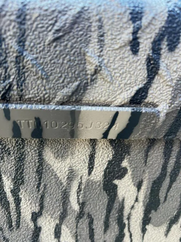 Slide: The Image of 2024 Havoc Boats 1756 FRRSC hull identification number on textured surface. - 9