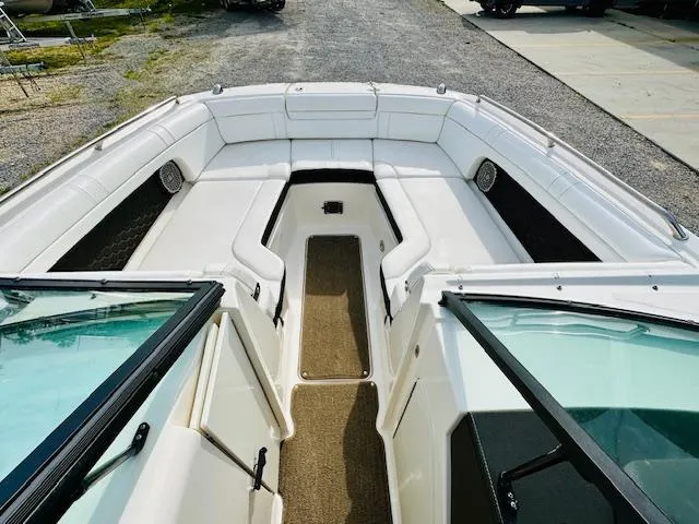 Slide: The Image of 2018 Sea Ray 270 SDX boat interior with spacious seating and clean design. - 7