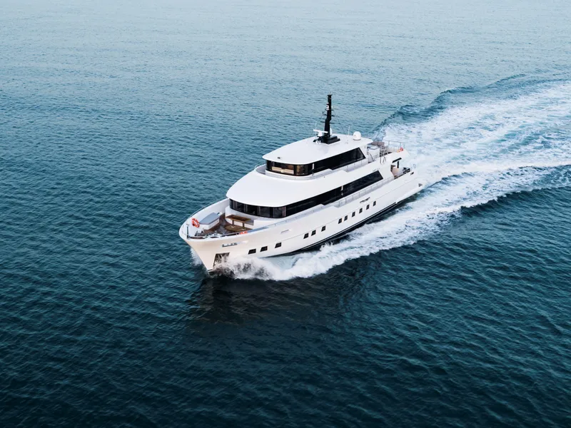 Slide: The Image of Luxurious 2025 Nomad 95 SUV yacht cruising on open sea. - 37