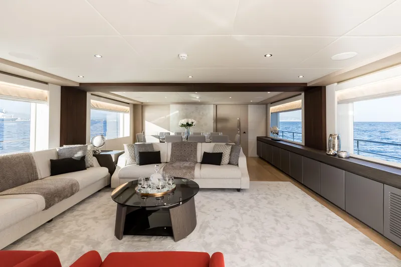 Slide: The Image of Luxurious interior of 2025 Nomad 95 SUV yacht with elegant seating and ocean views. - 4