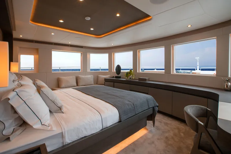 Slide: The Image of Luxurious bedroom interior of 2025 Nomad 95 SUV yacht with ocean views. - 8