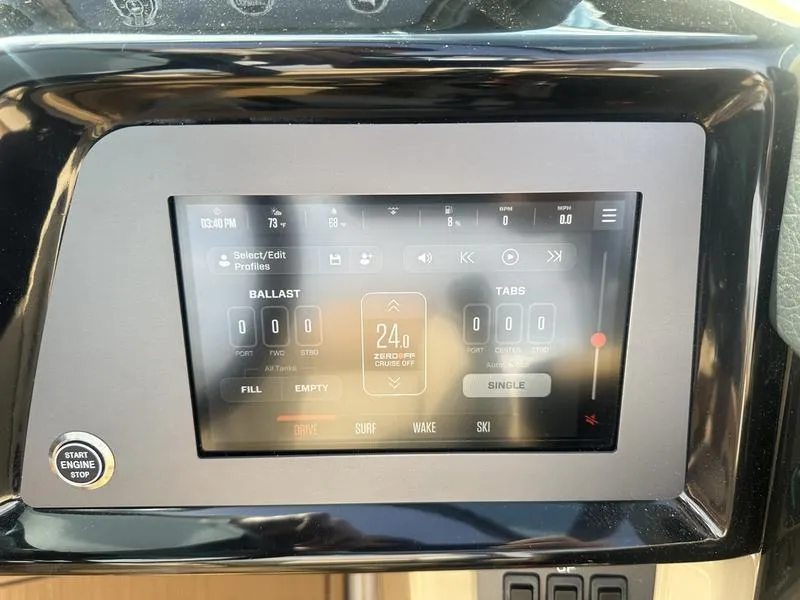 Slide: The Image of 2024 MasterCraft NXT21 touchscreen control panel displaying ballast and tabs settings. - 14