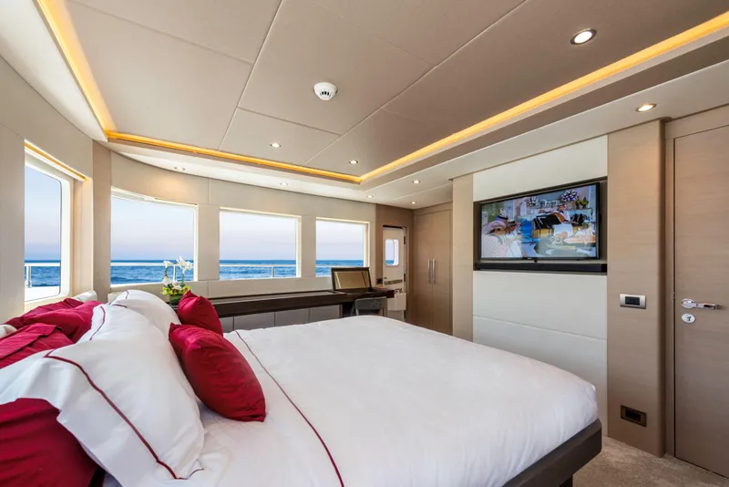 Slide: The Image of Luxurious bedroom interior of 2025 Nomad 75 SUV yacht with ocean view and modern decor. - 10