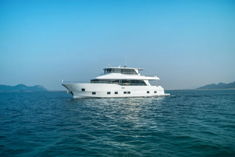 Slide: The Image of Luxury Nomad 75 SUV yacht cruising on open sea, 2025 model. - 31