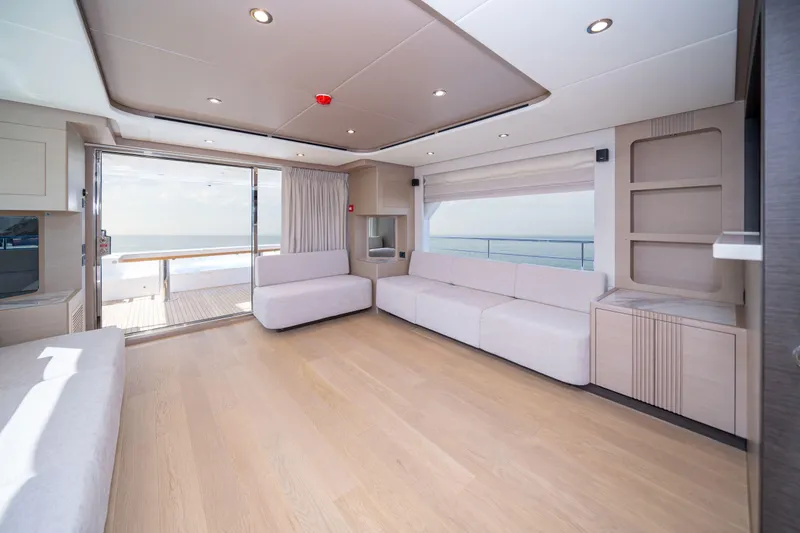 Slide: The Image of Luxurious interior of 2025 Nomad 75 SUV yacht with spacious seating and ocean view. - 4