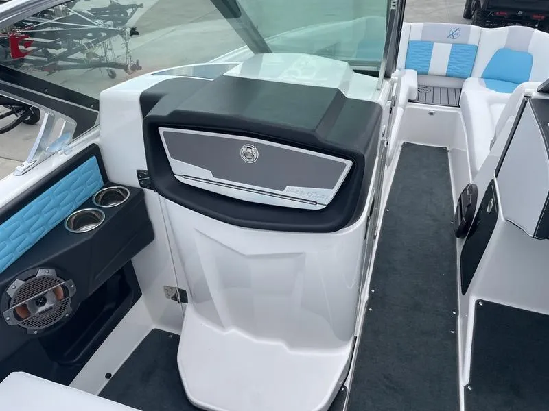Slide: The Image of 2019 MasterCraft X26 boat interior with modern dashboard and seating. - 7