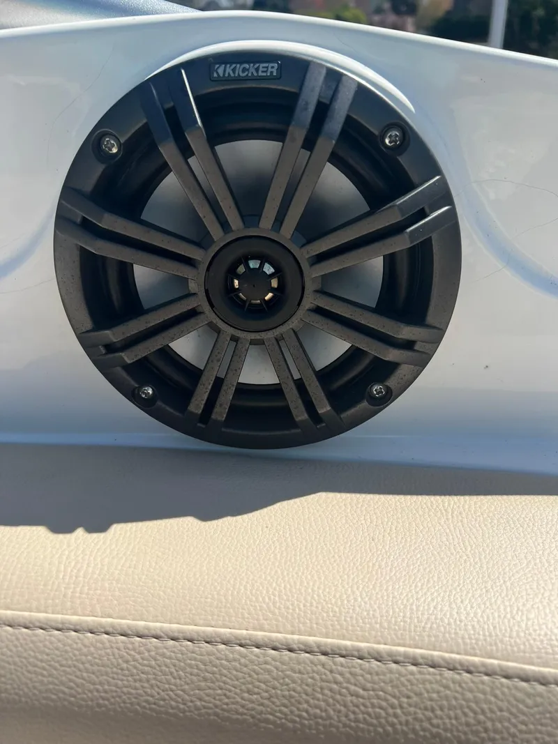 Slide: The Image of Kicker speaker on a 2014 Rinker 246 Captiva Bowrider boat. - 14