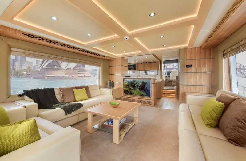 Slide: The Image of Luxurious Nomad 65 yacht interior with modern design, featuring plush seating and scenic views. - 3