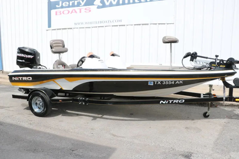 Slide: The Image of 2007 Nitro NX 591 DC fishing boat with Mercury engine on trailer. - 14