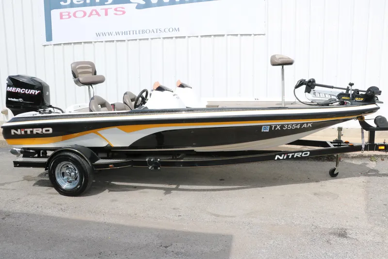 Slide: The Image of 2007 Nitro NX 591 DC fishing boat with Mercury engine on trailer. - 15