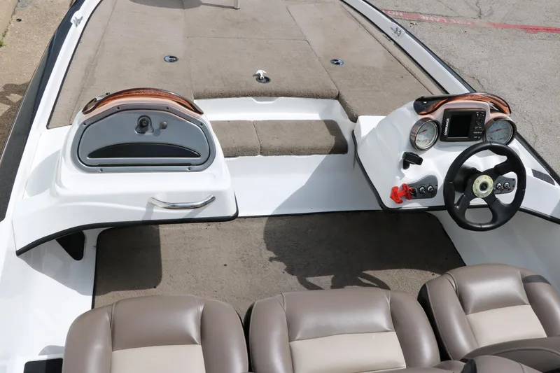 Slide: The Image of 2007 Nitro NX 591 DC boat interior with dual consoles and seating. - 23
