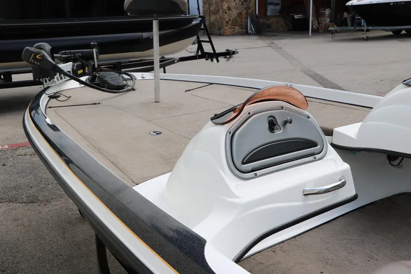 Slide: The Image of 2007 Nitro NX 591 DC boat deck with trolling motor and storage compartment. - 8