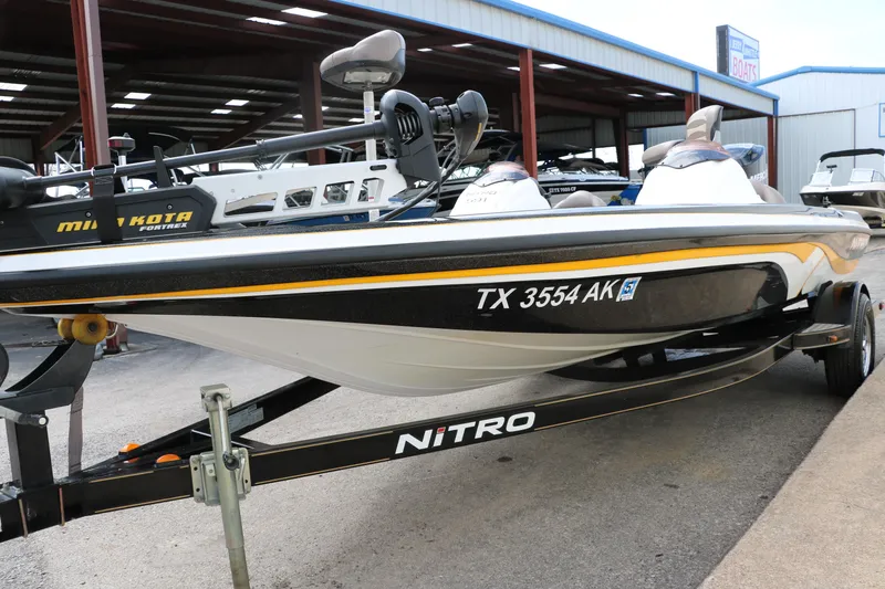 Slide: The Image of 2007 Nitro NX 591 DC fishing boat in a showroom. - 9