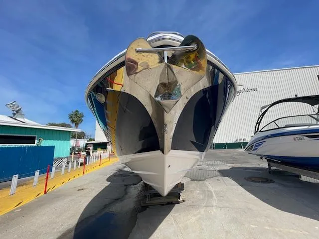 Slide: The Image of 2020 Regal 2800 boat on dry dock with blue sky background. - 2