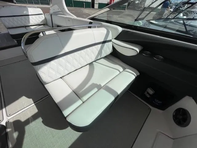 Slide: The Image of 2020 Regal 2800 boat interior with white leather seating and modern design. - 26