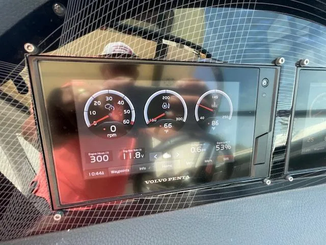 Slide: The Image of Dashboard of a 2020 Regal 2800 boat showing engine metrics and gauges. - 29