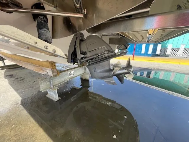 Slide: The Image of Close-up of a 2020 Regal 2800 boat's propeller and stern drive. - 6