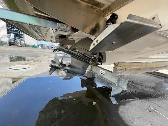 Slide: The Image of Close-up of a 2020 Regal 2800 boat's propeller and stern drive. - 7