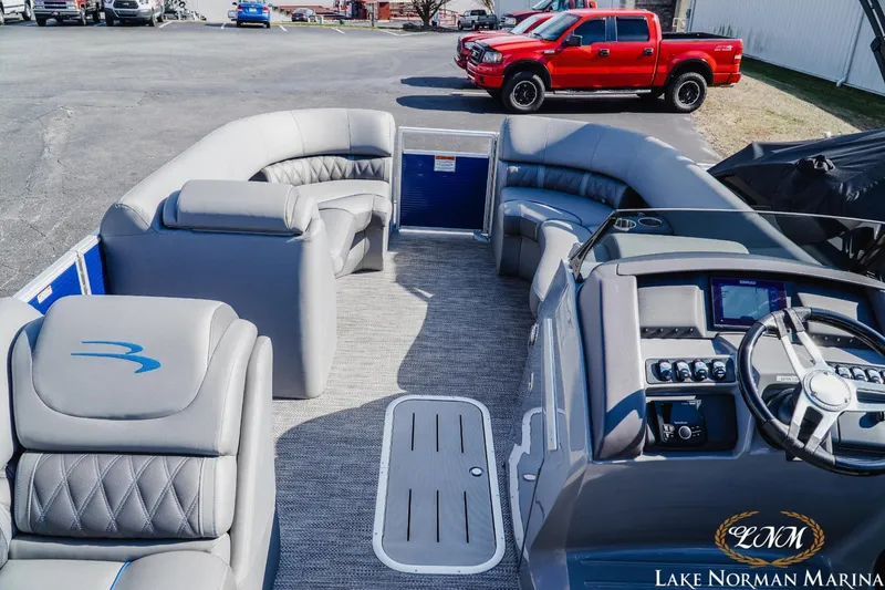 Slide: The Image of 2023 Bennington 24LXSB pontoon boat interior at Lake Norman Marina. - 7