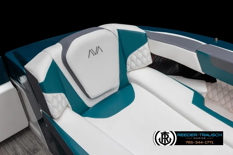 Slide: The Image of 2024 Avalon Excalibur VRB boat interior with teal and white seating. - 14
